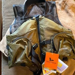 Field and stream adult fishing vest/flotation device.